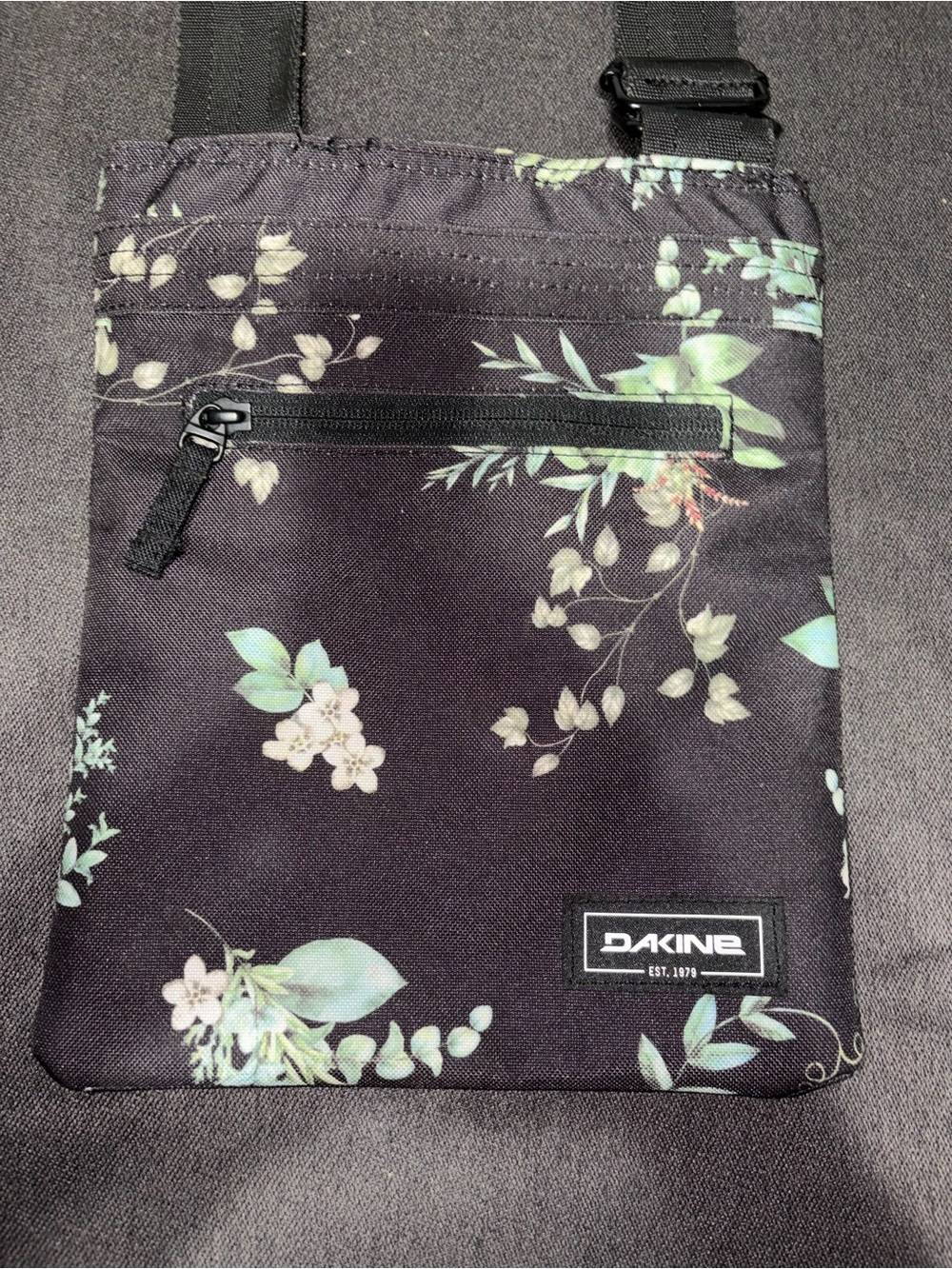 Dakine Black Floral Crossbody Sling Bag with Green and Cream Accents